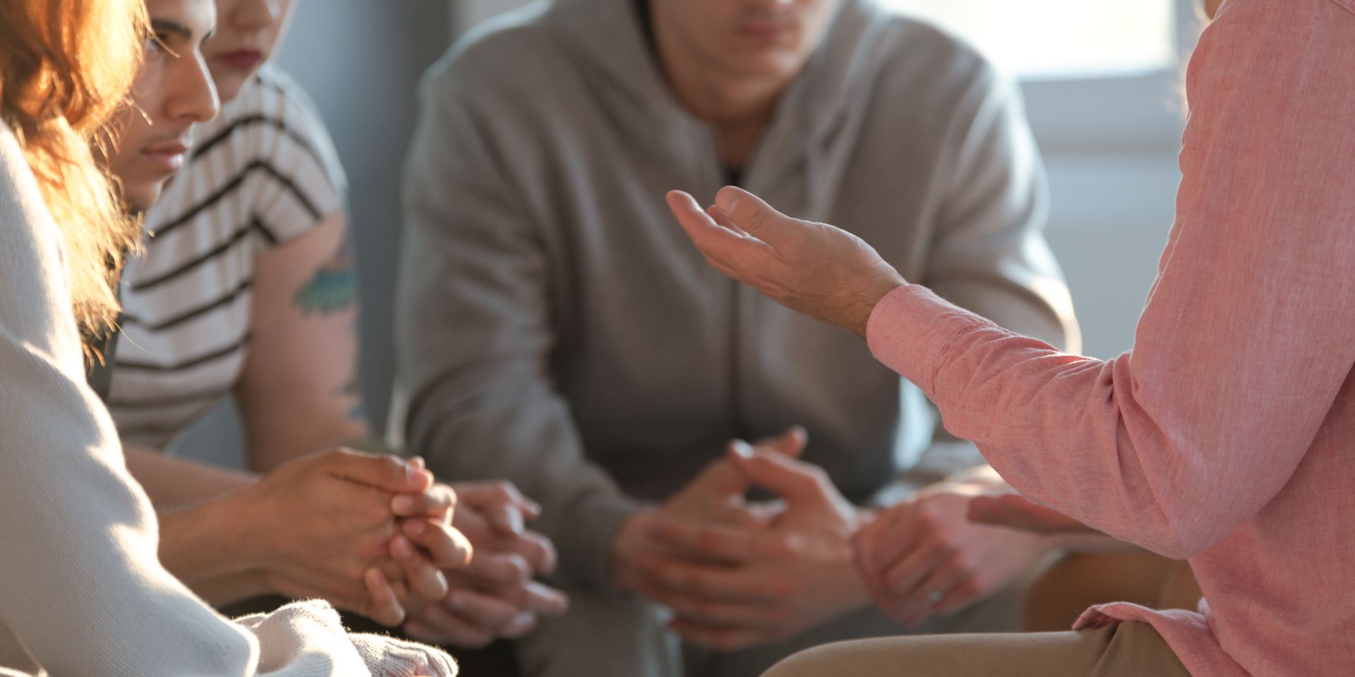 People sitting around the table talking